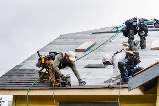 Professional Gutter Installation technician working in Kensington, CT